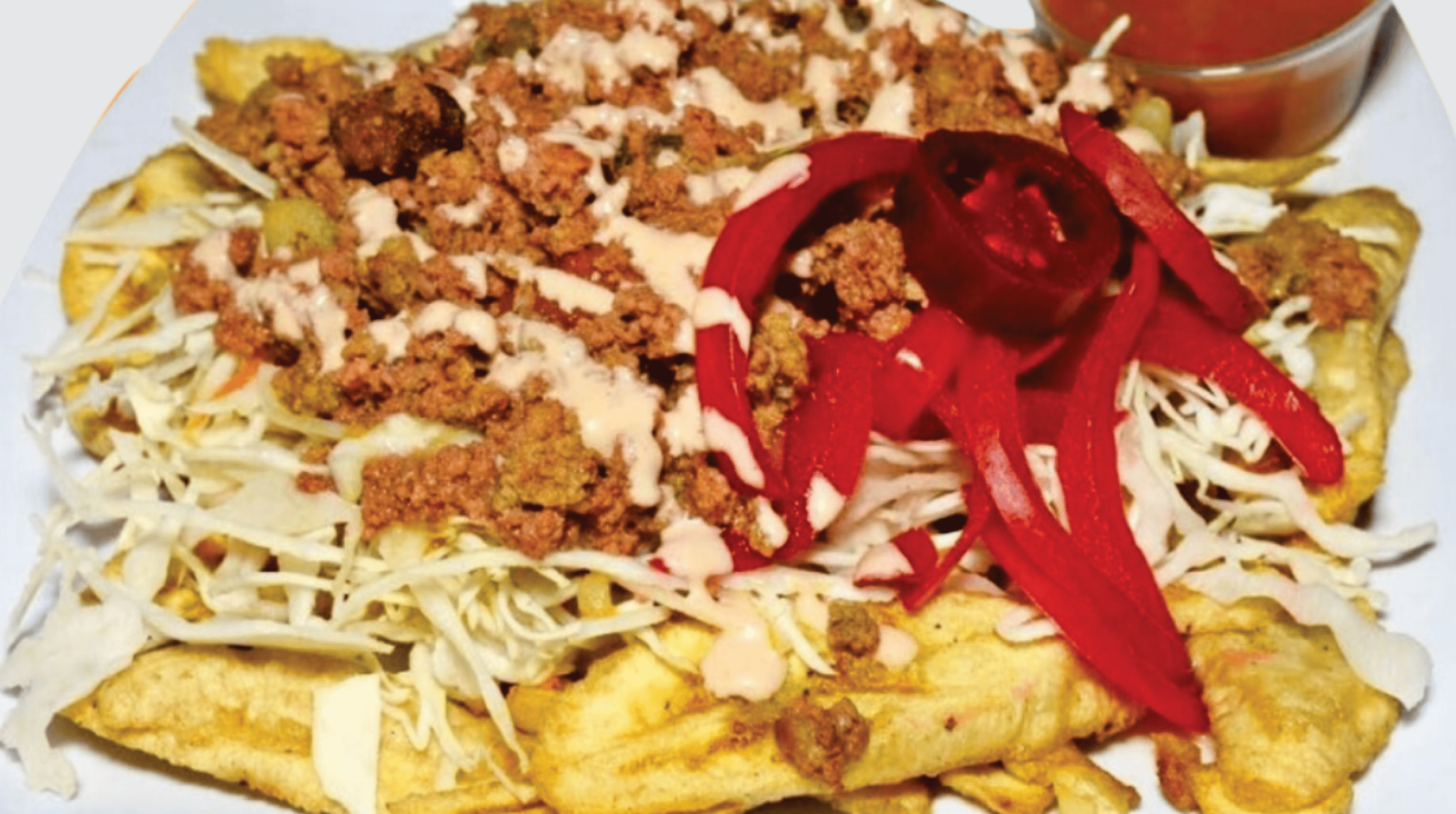 Carne molida con tajadas / Fried green bananas slides with ground beef